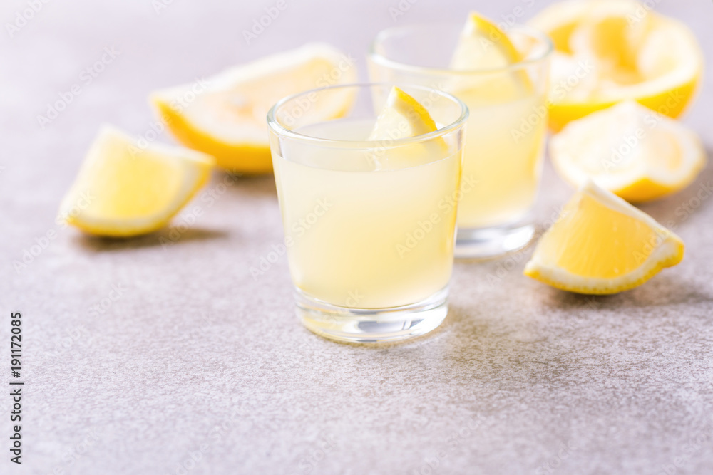 Italian lemon lime liqueur limoncello with ice and mint Italian lemon lime liqueur limoncello with ice and mint