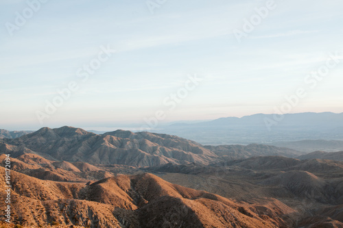 Couple overlooking palm springs from keys view in joshua tree national park
