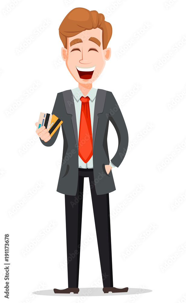 Handsome businessman in suit holding credit cards