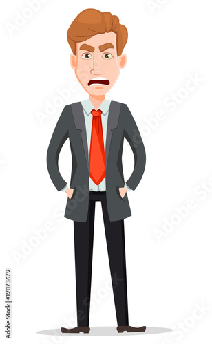 Handsome businessman in suit with angry face and hands in pockets
