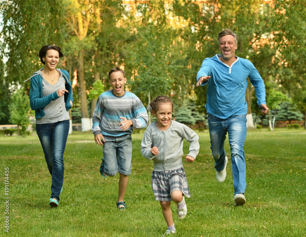 family in the green summer park family in the green summer park