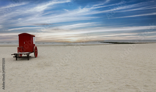 Wooden car on the beach