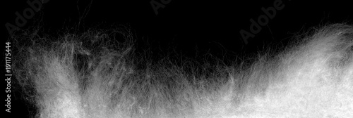 Medical cotton wool isolated on a black background. Highly detailed texture.