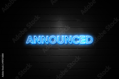 Announced neon Sign on brickwall