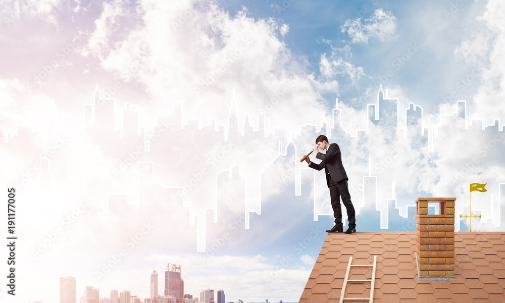 Engineer man standing on roof and looking in spyglass. Mixed media Engineer man standing on roof and looking in spyglass. Mixed media