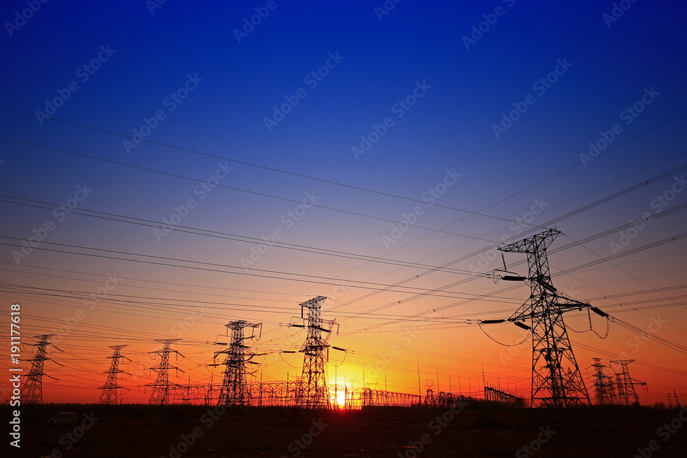 Sunset silhouette of pylon