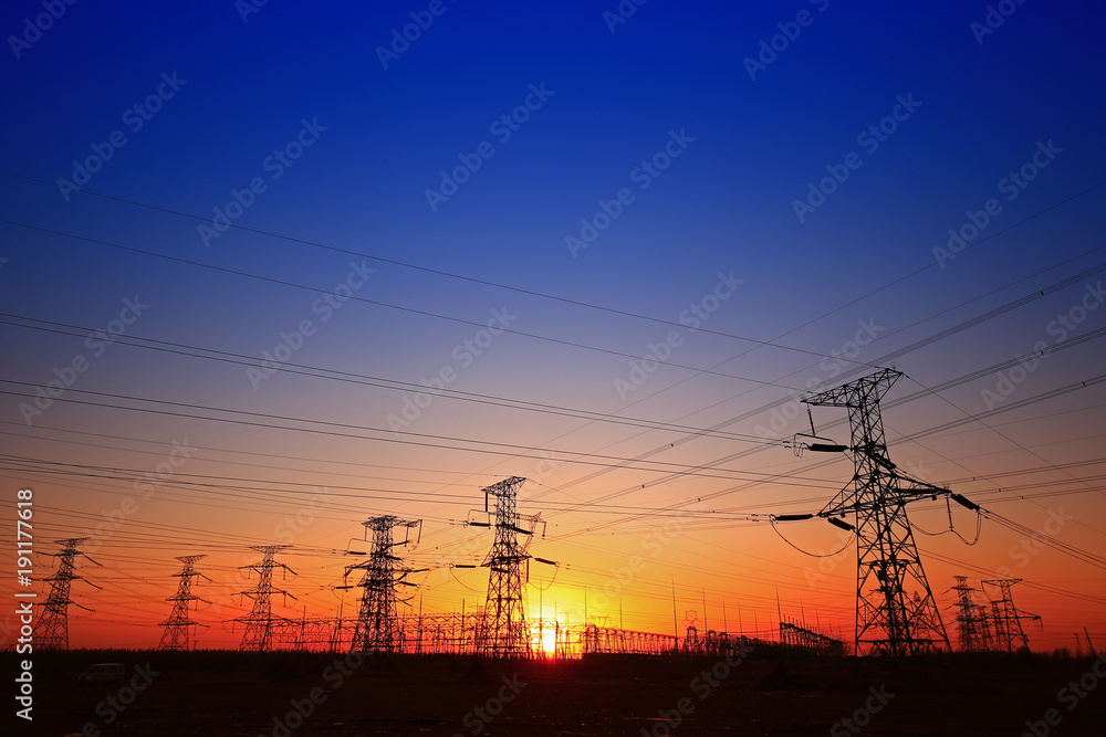 Sunset silhouette of pylon Sunset silhouette of pylon