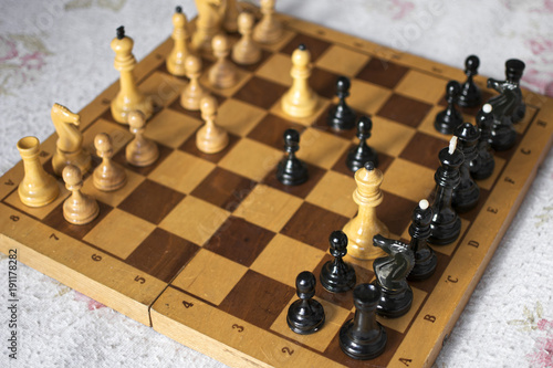 Chessboard with its chips in action
