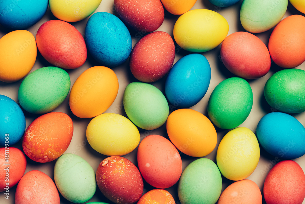 Multiple dyed eggs laying on the floor. Multiple dyed eggs laying on the floor.