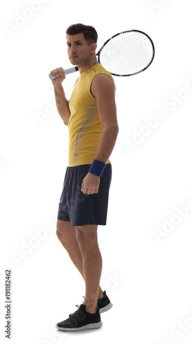 Portrait of handsome man playing tennis against white background © Africa Studio