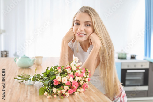 Beautiful young woman with ...