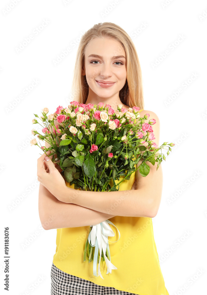 Beautiful young woman with bouquet of roses on white background