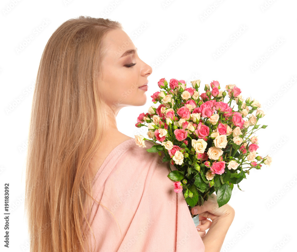 Beautiful young woman with bouquet of roses on white background Beautiful young woman with bouquet of roses on white background