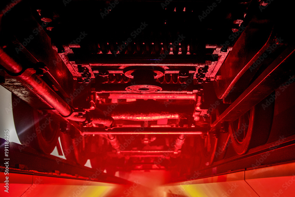 Chassis of a British 1930's steam locomotive. Seen from below with a ...