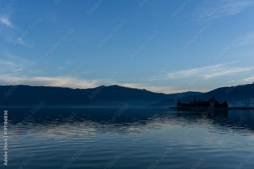 Island on the river Danube at dusk in the romanian port of Orsova