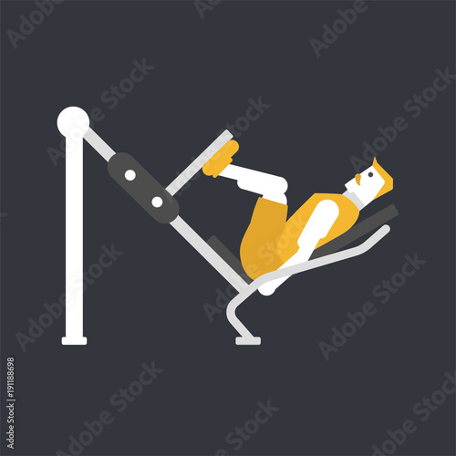 Athlete performs exercises on the simulator for the press legs