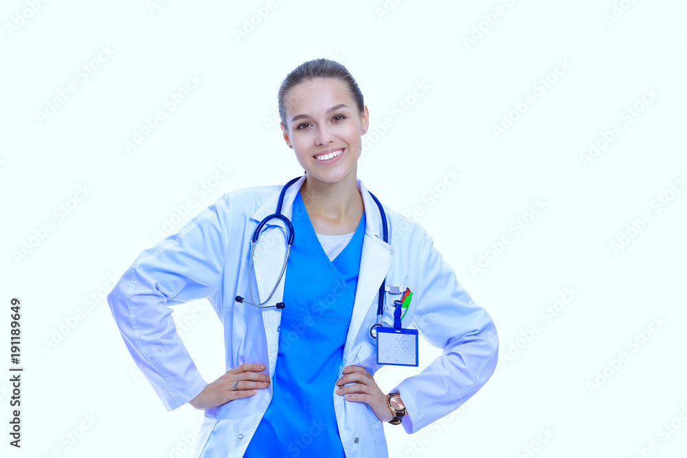 Beautiful young woman in white coat posing with hand in pocket. Woman doctor Beautiful young woman in white coat posing with hand in pocket. Woman doctor
