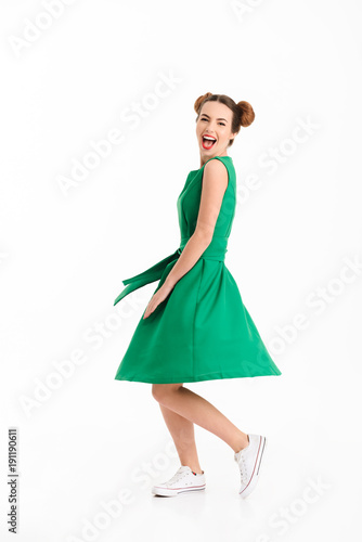 Full length portrait of a happy young girl