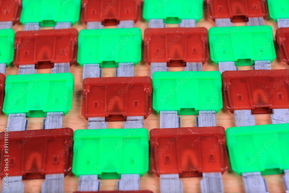Car fuses as electrical background Stock Photo Adobe Stock