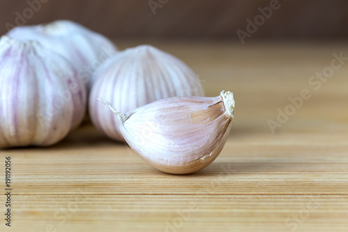 whole garlic on wood table