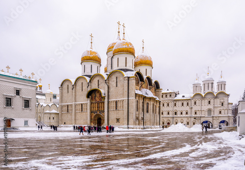 Dormition Cathedral and Cathedral Square in Moscow Kremlin in Moscow, Russia. Winter scene of Moscow Kremlin.