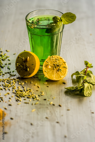 Fennel,variyali or Foeniculum vulgare juice/shrbat with sliced lemons,Citrus × limon photo