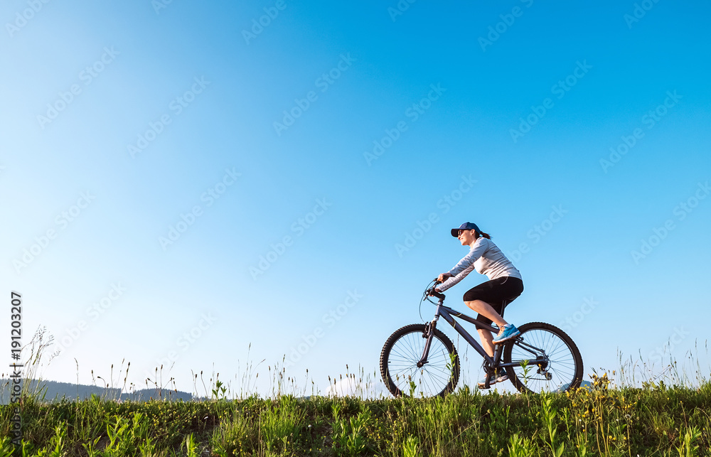 Woman ride a bicykle