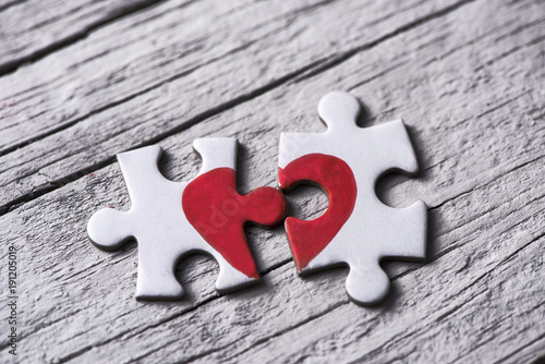 puzzle pieces which form a heart photo