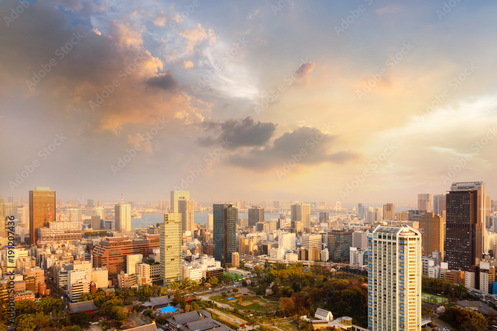 Landscape of tokyo city skyline in Aerial view with skyscraper, modern office building and sunset sky background in Tokyo metropolis, Japan.