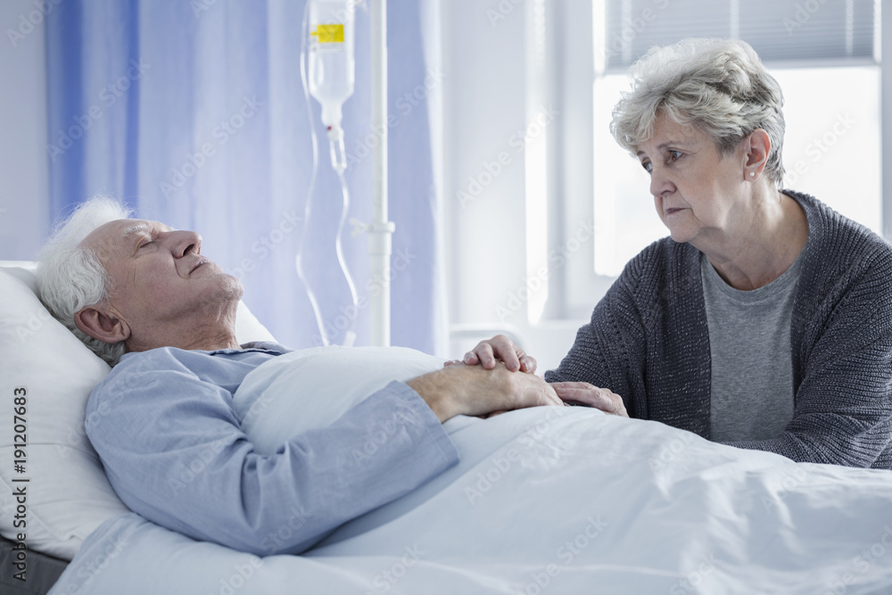 Obraz premium Sick man and worried wife