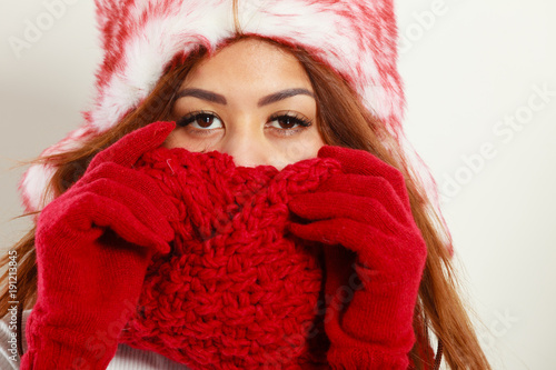 woman wearing warm winter clothing, closeup