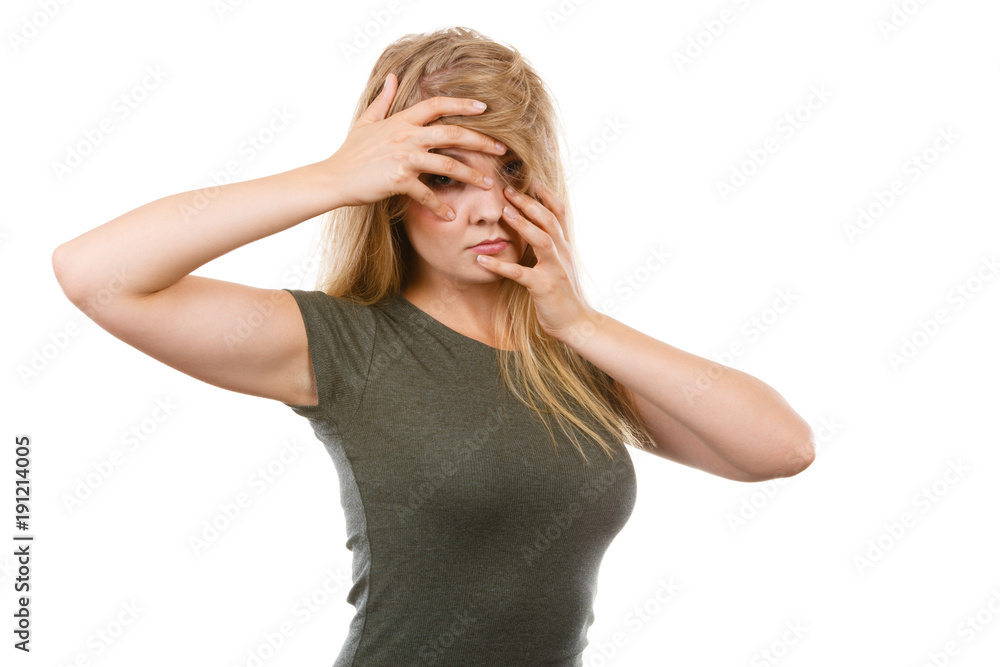 Ashamed embarrassed blonde woman with hands on face Ashamed embarrassed blonde woman with hands on face