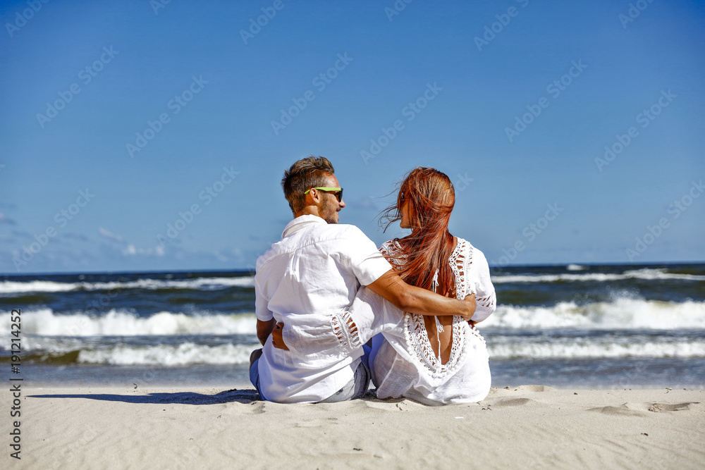 Valentine day on beach and two lovers 