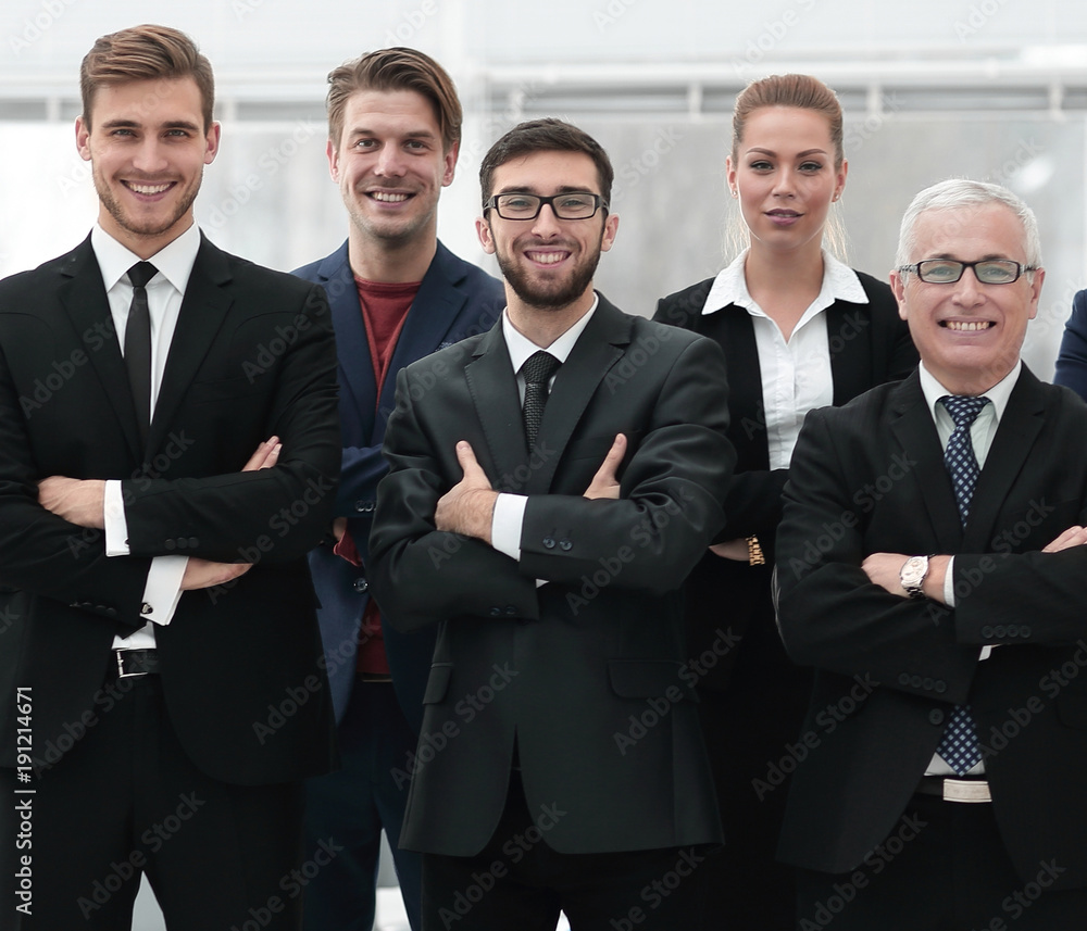 senior businessman and his confident business team senior businessman and his confident business team