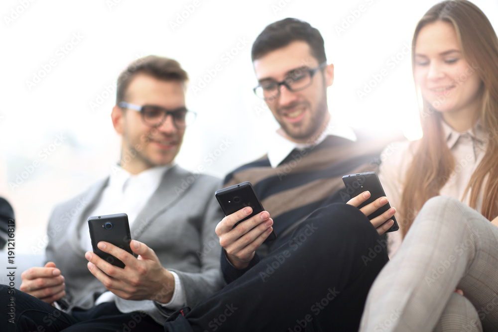 closeup. employees talking in the workplace closeup. employees talking in the workplace