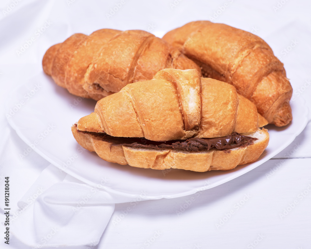 baked croissants with chocolate baked croissants with chocolate