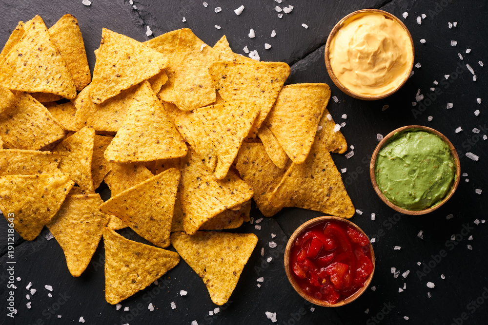 Triangular corn chips, mexican nachos with sauces Stock Photo Adobe Stock