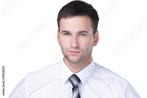 Portrait of a handsome business man isolated on white.