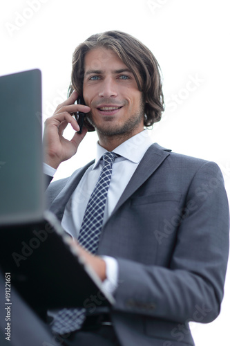 closeup.successful businessman talking on mobile