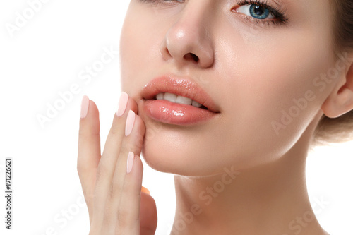 Close up view of young beautiful woman face photo