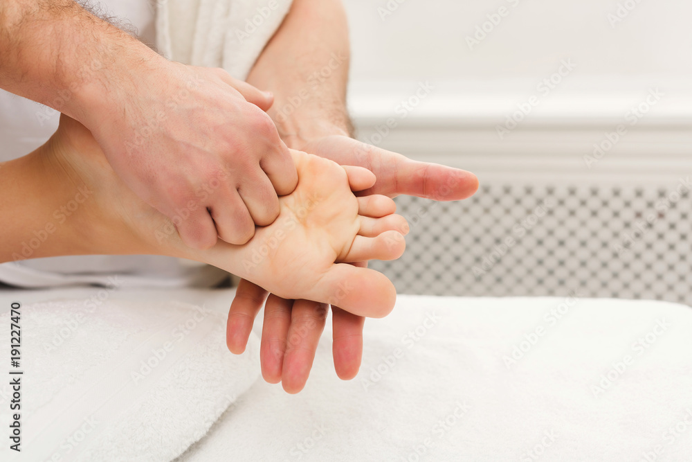 Fototapeta premium Feet massage closeup, acupressure