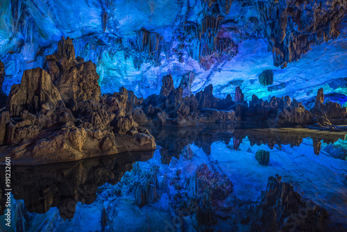 Illumination of underground caves with lakes in Guilin City, Guangxi Province, People's Republic of China