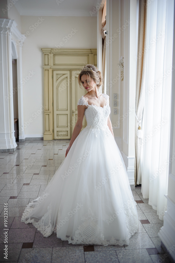 Beautiful bride in wedding dress before wedding ceremony Beautiful bride in wedding dress before wedding ceremony