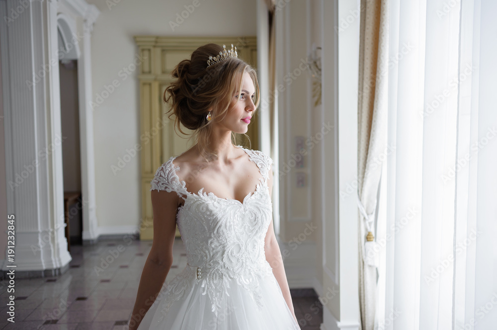 Beautiful bride in wedding dress before wedding ceremony Beautiful bride in wedding dress before wedding ceremony