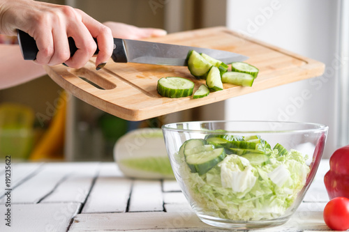 Obraz na plátně Vegetables lie on a table on a chopping board