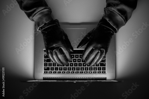 Cybercrime, a laptop hacker, writes codes to access unauthorized things, an illegal way, hacker, crime, cyber