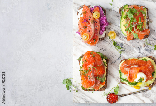 Smorrebrod with red fish on rye bread