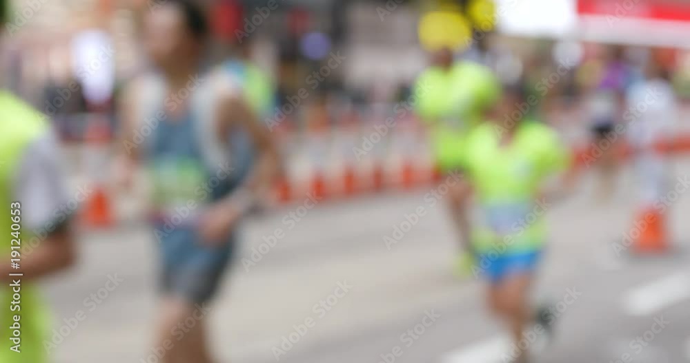 Blur view of marathon in city Blur view of marathon in city