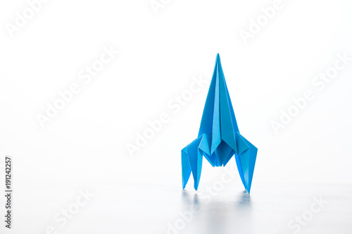 Paper homemade origami rocket. photo