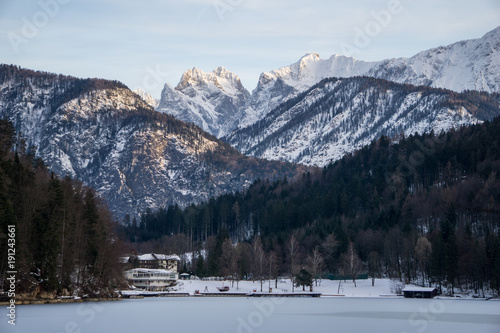Restaurant and cabin on the shore of the Hechtsee lake in the Alps of Tyrol © Emil